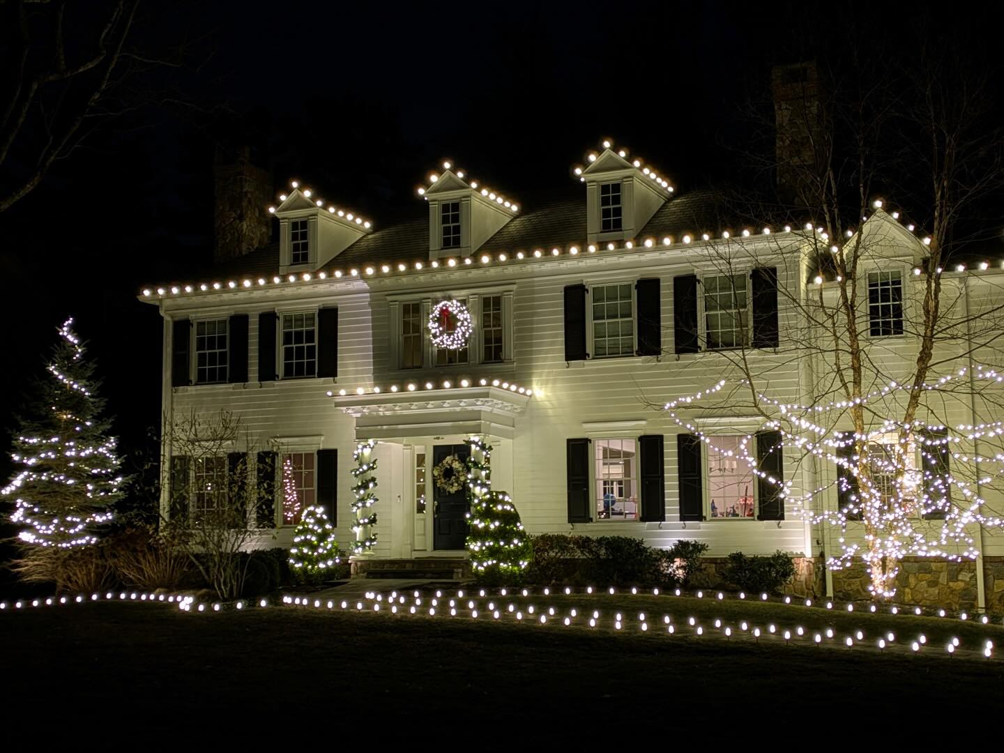Colonial home holiday lighting with wreaths NJ warm white